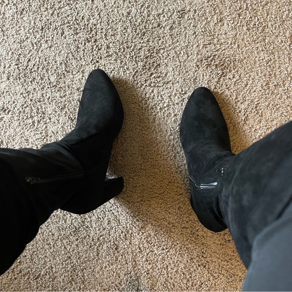 Knee high black heel boots